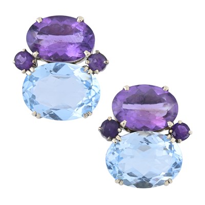 Lot 164 - A pair of blue topaz and amethyst earrings