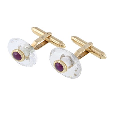 Lot 74 - A pair of 9ct gold rock crystal and ruby cabochon cufflinks