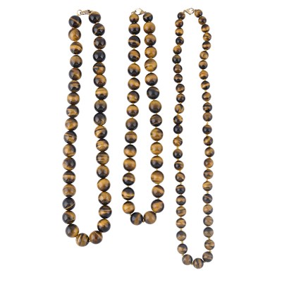 Lot 457 - Three tiger's-eye bead necklaces