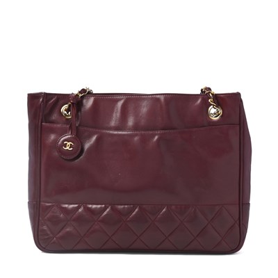 Lot 295 - Chanel, a vintage burgundy leather tote.
