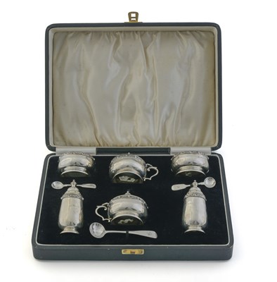 Lot 196 - A George V cased silver six-piece condiment...