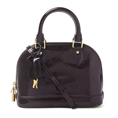 Lot 479 - Louis Vuitton, a monogram Amarante Vernis Alma BB handbag.