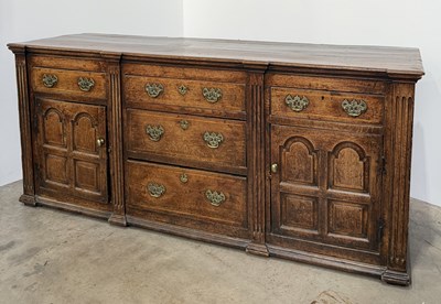 Lot 737 - An 18th century rustic oak dresser base, a...