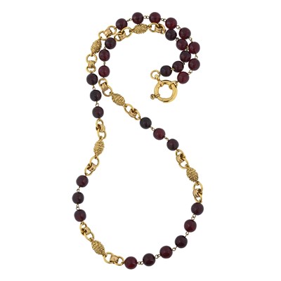 Lot 335 - Chanel, a vintage red Gripoix and gold-plated bead necklace.