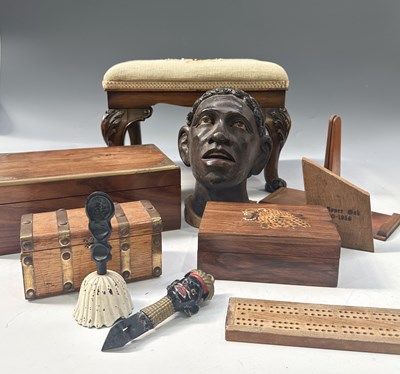 Lot 90 - A collection of wood and treen: a small...
