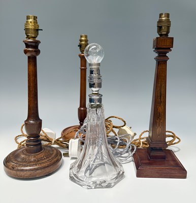 Lot 242 - A collection of three wooden and one glass...