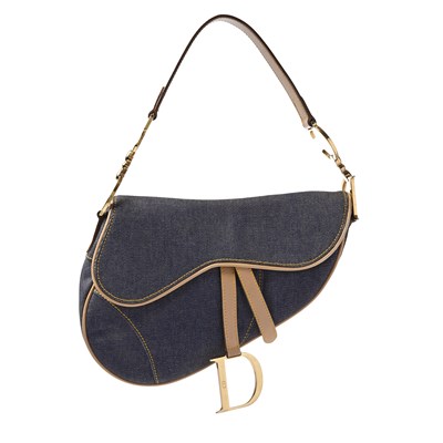 Lot 367 - Christian Dior, a blue denim Saddle handbag.