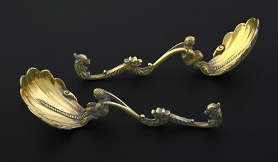 Lot 126 - A pair of Victorian cast silver-gilt caddy...