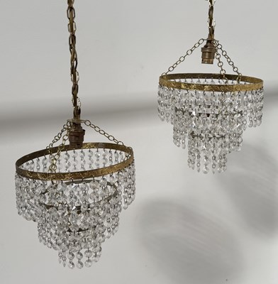 Lot 249 - Pair of three-tier gilt metal and facet bead...