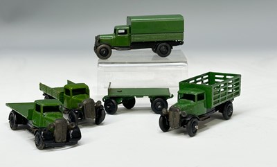 Lot 293 - Four Dinky trucks, 25A truck (flatbed), 25B...