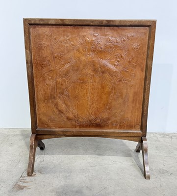 Lot 781 - An Arts & Crafts mahogany and leather fire...