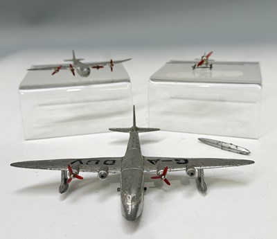 Lot 295 - A collection of three Dinky Toys pre-WWII...