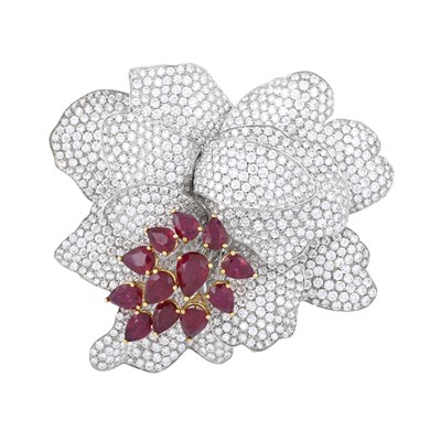 Lot 143 - Picchiotti, a ruby and brilliant-cut diamond flower brooch