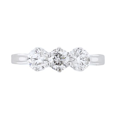 Lot 73 - An 18ct gold brilliant-cut diamond three stone ring