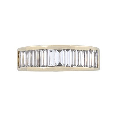 Lot 150 - A baguette-cut diamond half eternity ring