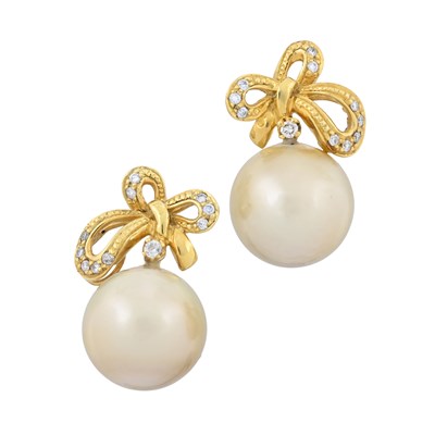 Lot 25 - A pair of South Sea cultured pearl and brilliant-cut diamond bow drop earrings