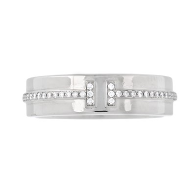 Lot 114 - Tiffany & Co., an 18ct gold brilliant-cut diamond Tiffany T band ring