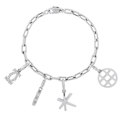 Lot 88 - Cartier, a charm bracelet suspending four charms