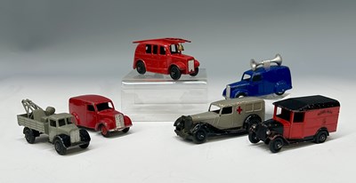 Lot 285 - A collection of six Dinky Toys utility...