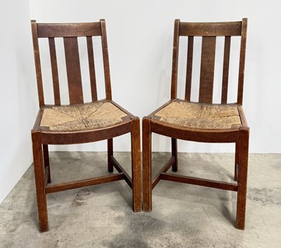 Lot 791 - A pair of Heal and Sons 1930's oak and rush...