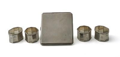 Lot 261 - Four George V silver napkin rings, by S J Levi...