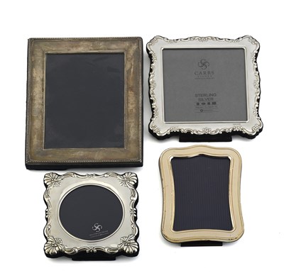 Lot 259 - Four twentieth-century silver-mounted...
