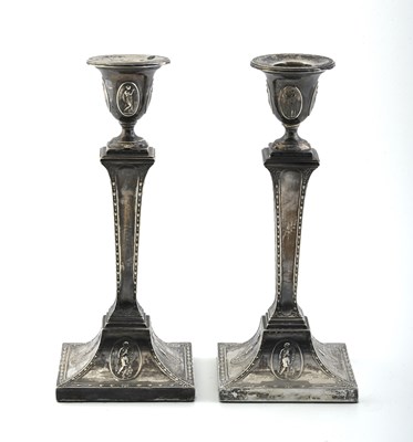 Lot 301 - A pair of Edwardian silver candlesticks, by...