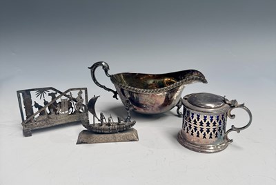 Lot 534 - Two Eastern white metal trinkets, a plated...