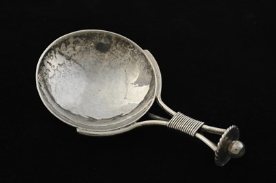Lot 137 - A. E. Jones, an Edwardian Arts & Crafts silver...