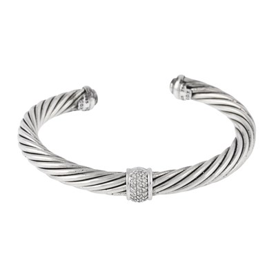 Lot 390 - David Yurman, a brilliant-cut diamond Cable cuff bangle.