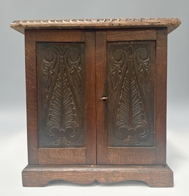 Lot 278 - An Arts & Crafts oak stationery cabinet, circa...