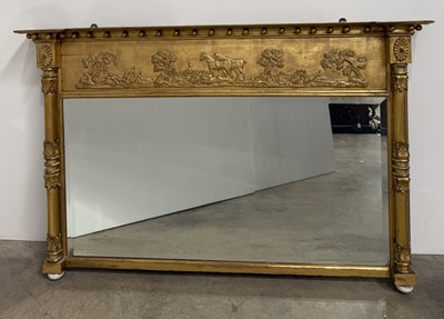 Lot 721 - An early 19th century gilt wood over mantle...