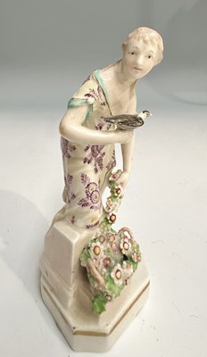 Lot 105 - A Derby porcelain figure of a female with a...