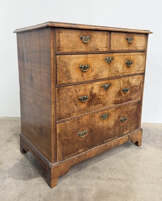 Lot 812 - A late 18th century walnut veneered chest of...