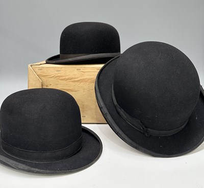 Lot 335 - A set of three bowler hats; one bearing a Moss...