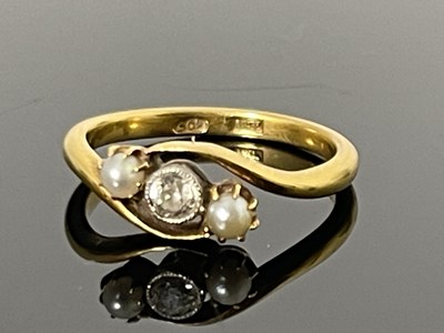 Lot 17 - An 18ct gold diamond and pearl set three stone...