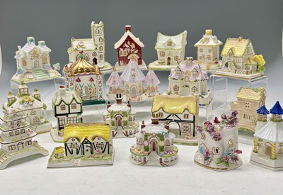 Lot 39 - A collection of Coalport bone china cottages...