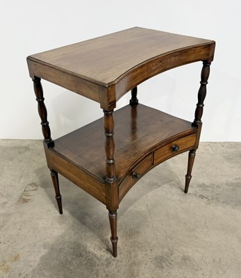 Lot 811 - An early 19th century convex front two stage...