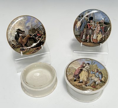 Lot 123 - Three military-themed Prattware pot lids: 'War'...
