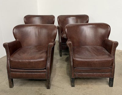 Lot 726 - A set of four contemporary studded arms chairs...