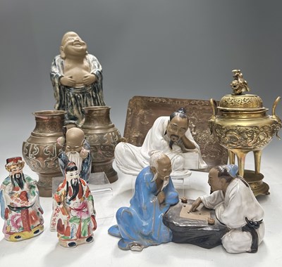 Lot 47 - A late 19th/ early 20th century, Chinese brass...