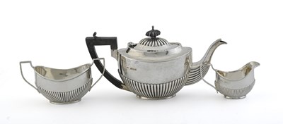 Lot 271 - An Edwardian silver three-piece tea set, by...