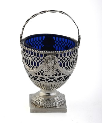 Lot 245 - A George III neoclassical silver swing handle...