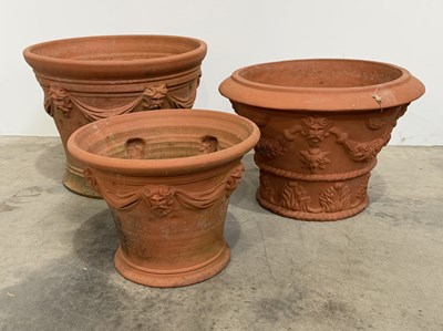 Lot 844 - Three Whichford garlanded pottery garden pots,...
