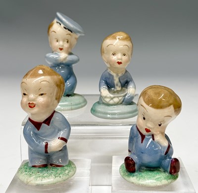 Lot 103 - A series of four Wade Nursery Rhyme figurines,...