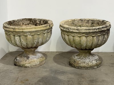 Lot 838 - A pair of large stone cast garden urn planters,...