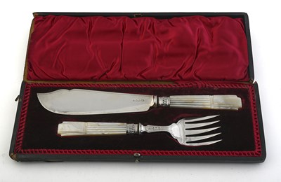 Lot 253 - A Victorian set of silver fish servers, by...