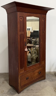 Lot 822 - An Arts & Crafts quarter sawn oak wardrobe, a...