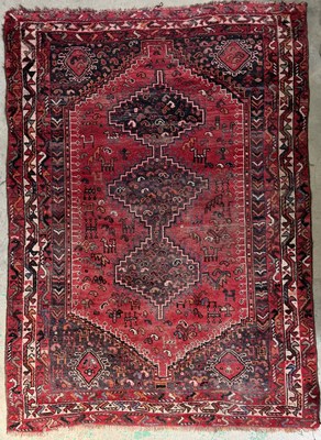 Lot 708 - A shiraz-type rug, triple stepped medallions...