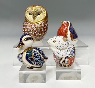 Lot 108 - A small collection of gold stoppers, bone...